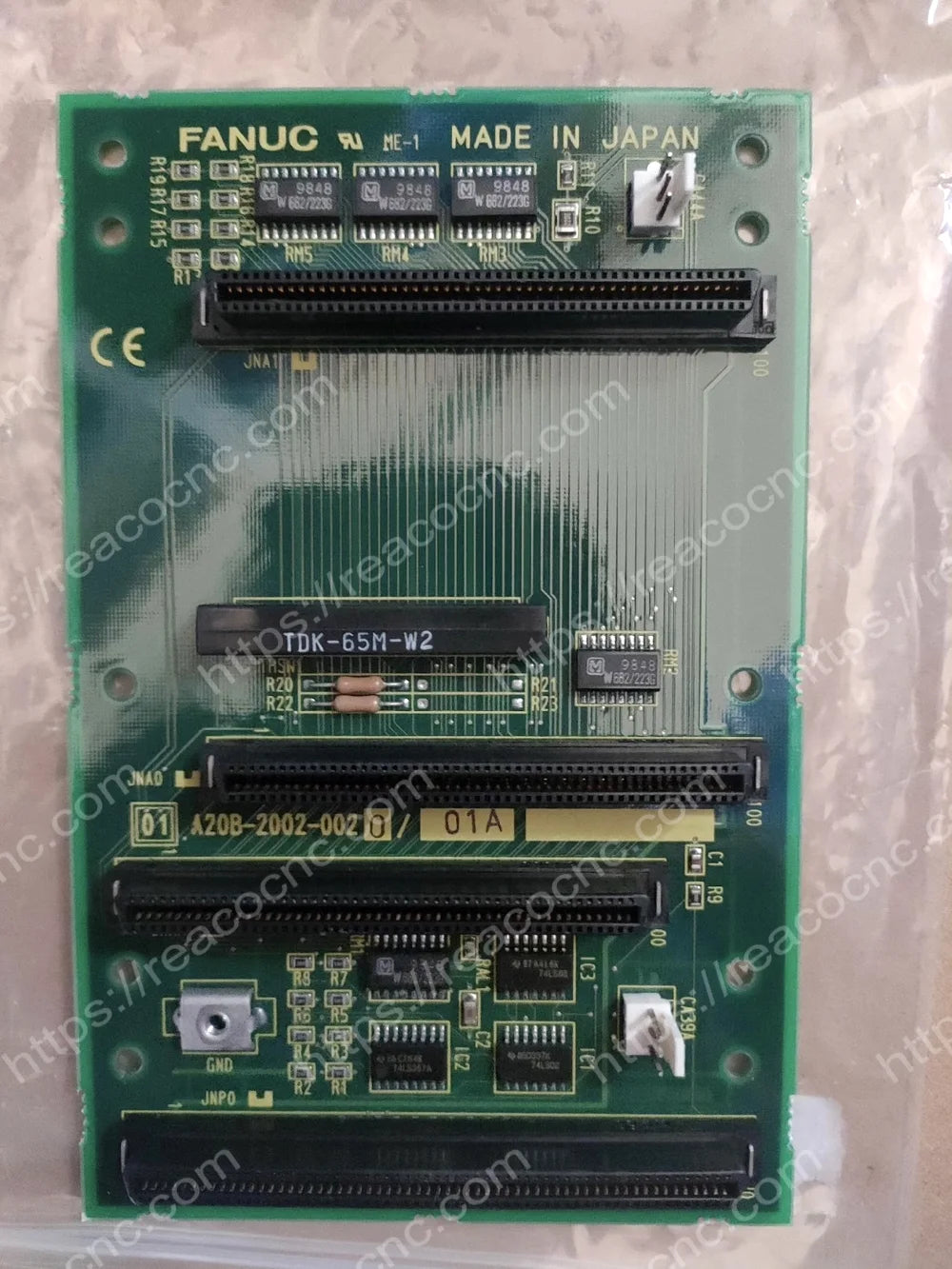 Front view of A20B-2002-0020 Fanuc backplane board with 3-slot layout