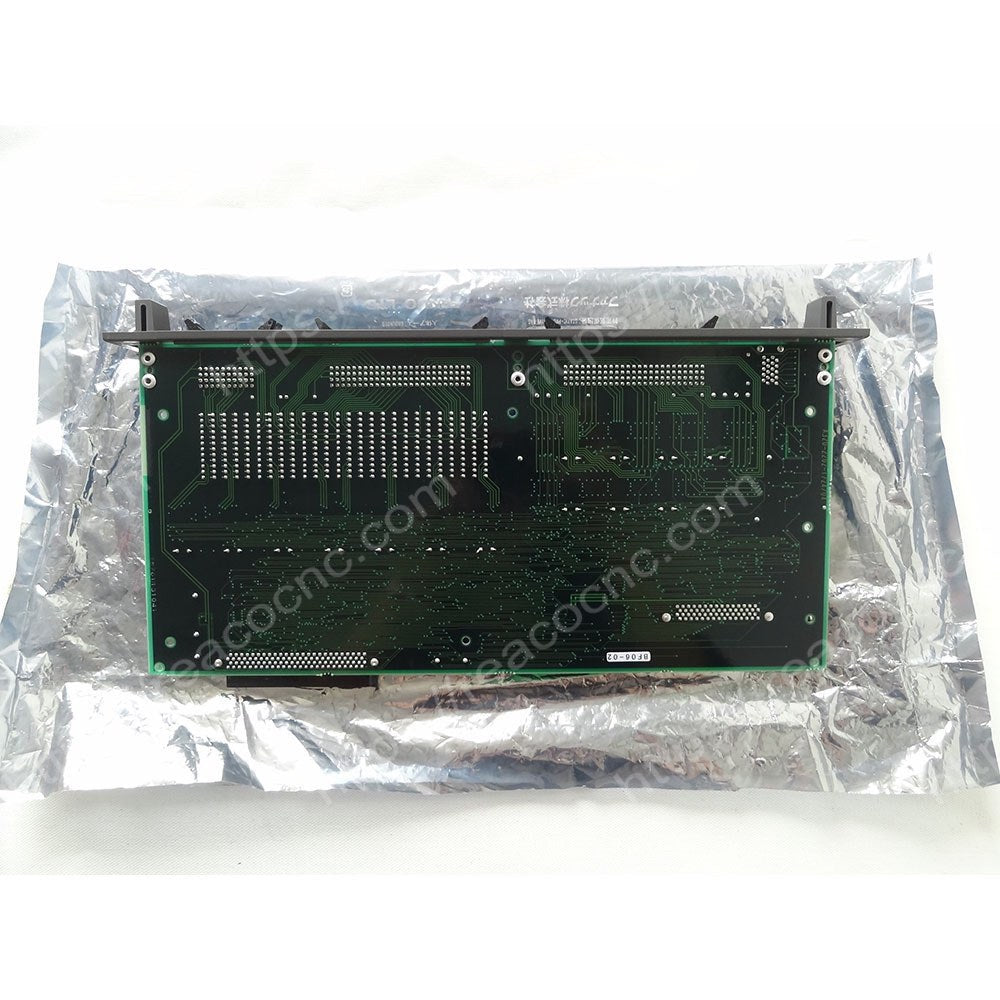 Back side of FANUC A16B-2202-0721 PCB showing circuit layout