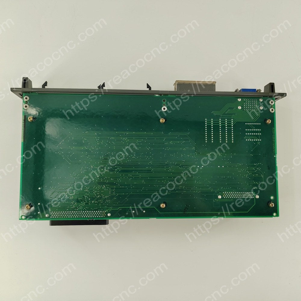 Back side of FANUC A16B-2203-0200 PCB showing circuit layout