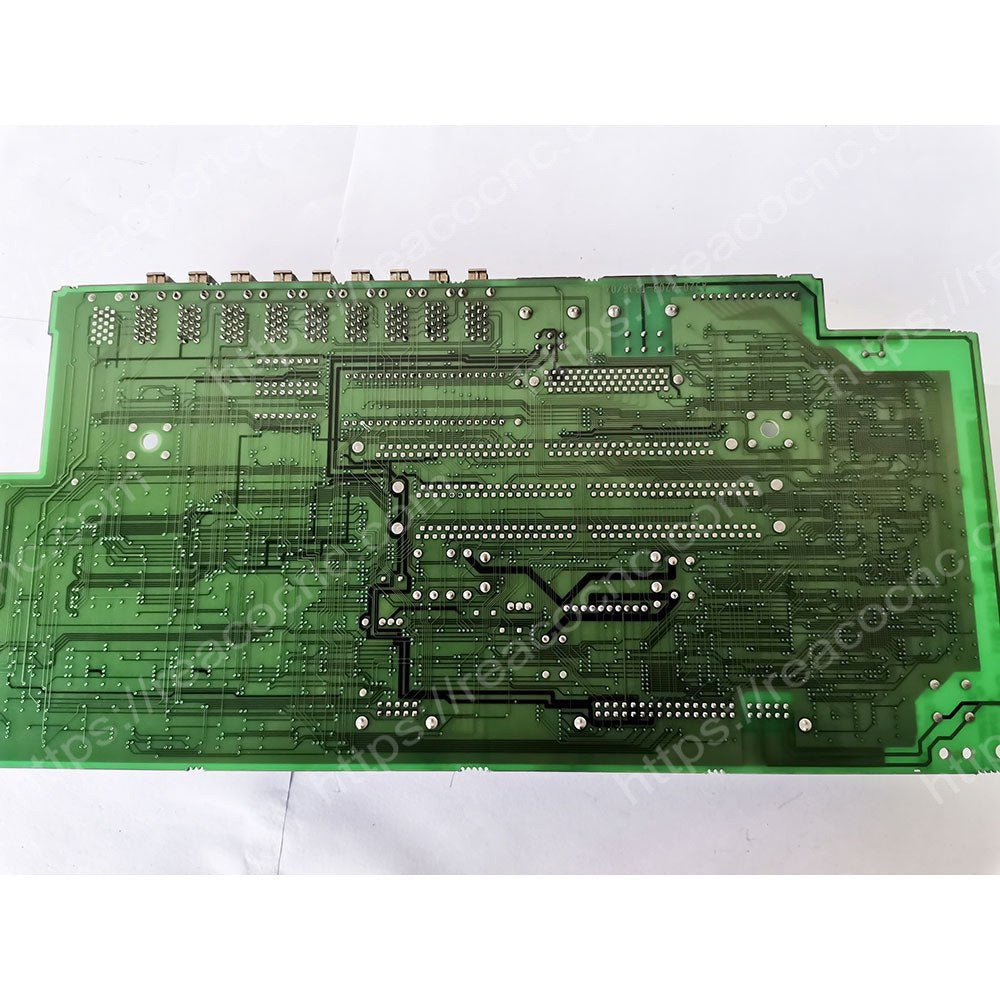 Back side of FANUC A16B-2203-0332 PCB showing circuit layout